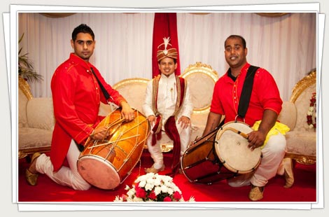 Dhol players escorting groom